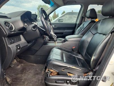 Zdjęcie 7 z 12 samochodu: 2012 HONDA PILOT TOURING VIN:5FNYF4H97CB065574 - miniatura
