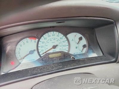 Zdjęcie 9 z 12 samochodu: 2004 TOYOTA COROLLA LE VIN:JTDBR32E642030042 - miniatura