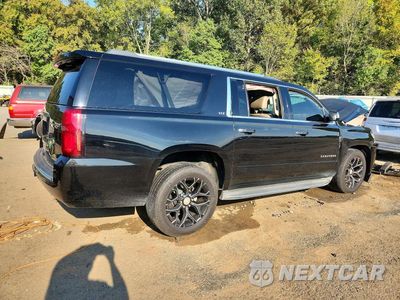 Trzecie zdjęcie samochodu z tyłu: 2015 CHEVROLET SUBURBAN K1500 LTZ VIN:1GNSKKKC6FR121990 - miniatura