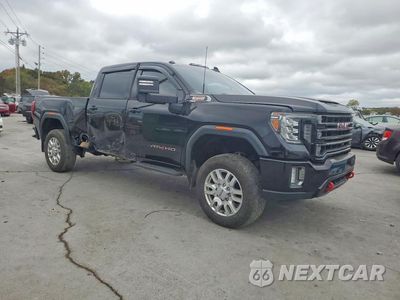 Czwarte zdjęcie samochodu z boku: 2021 GMC SIERRA K3500 AT4 VIN:1GT49VEY3MF146480 - miniatura