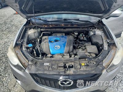 Zdjęcie 12 z 13 samochodu: 2013 MAZDA CX-5 TOURING VIN:JM3KE2CEXD0116364 - miniatura