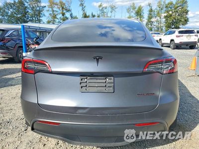 Zdjęcie 6 z 13 samochodu: 2022 TESLA MODEL Y VIN:7SAYGDEFXNF522441 - miniatura