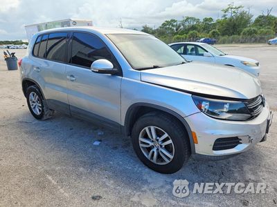 Czwarte zdjęcie samochodu z boku: 2013 VOLKSWAGEN TIGUAN S VIN:WVGAV7AX5DW540209 - miniatura