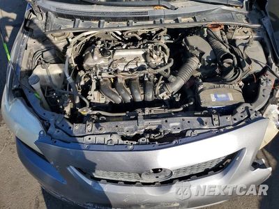 Zdjęcie 11 z 12 samochodu: 2009 TOYOTA COROLLA LE VIN:JTDBL40E99J049076 - miniatura