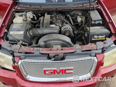 Zdjęcie 12 z 13 samochodu: 2006 GMC ENVOY DENALI XL VIN:1GKET66M866109584 - miniatura