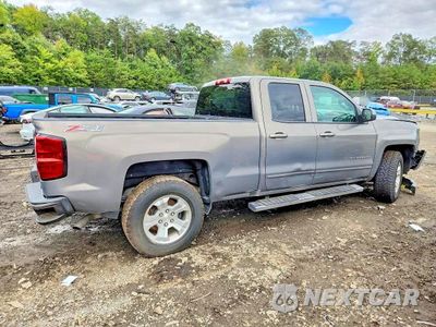 Trzecie zdjęcie samochodu z tyłu: 2017 CHEVROLET SILVERADO K1500 LT VIN:1GCVKRECXHZ206795 - miniatura