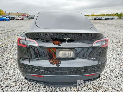 Zdjęcie 6 z 12 samochodu: 2023 TESLA MODEL Y VIN:7SAYGDEE1PA053344 - miniatura