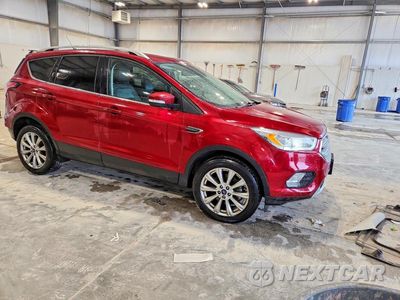 Czwarte zdjęcie samochodu z boku: 2018 FORD ESCAPE TITANIUM VIN:1FMCU9J97JUB73880 - miniatura