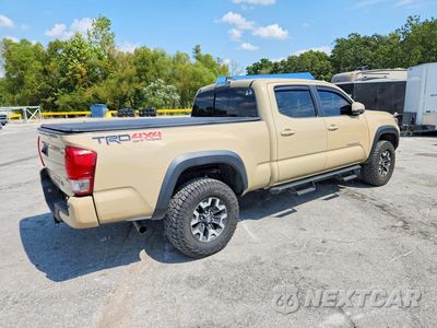 Trzecie zdjęcie samochodu z tyłu: 2017 TOYOTA TACOMA TRD OFF-ROAD VIN:3TMDZ5BN5HM014580 - miniatura
