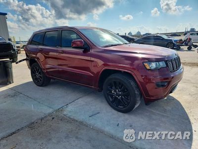 Czwarte zdjęcie samochodu z boku: 2019 JEEP GRAND CHEROKEE LAREDO VIN:1C4RJEAG3KC596428 - miniatura