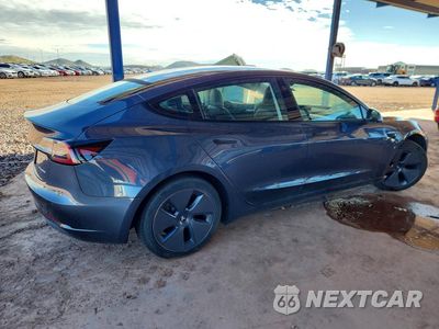 Trzecie zdjęcie samochodu z tyłu: 2022 TESLA MODEL 3 VIN:5YJ3E1EB8NF299390 - miniatura