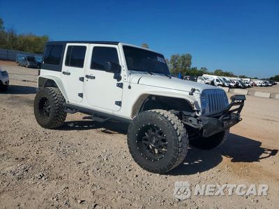 Czwarte zdjęcie samochodu z boku: 2015 JEEP WRANGLER UNLIMITED SPORT VIN:1C4BJWDG0FL666170 - miniatura