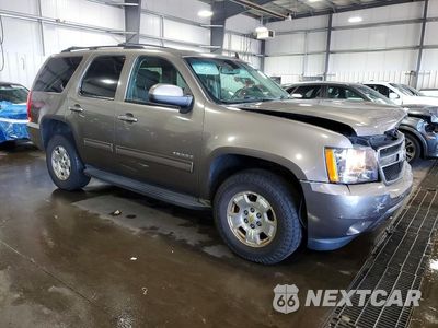 Czwarte zdjęcie samochodu z boku: 2011 CHEVROLET TAHOE K1500 LS VIN:1GNSKAE02BR283069 - miniatura