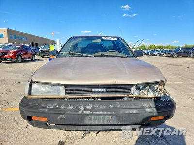 Piąte zdjęcie samochodu w środku: 1989 TOYOTA COROLLA DELUXE VIN:1NXAE92E6KZ063257 - miniatura
