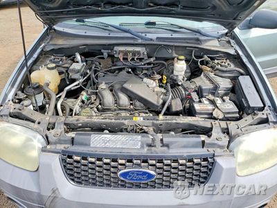 Zdjęcie 12 z 13 samochodu: 2007 FORD ESCAPE XLT VIN:1FMYU93127KA30174 - miniatura