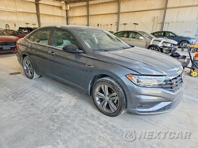 Czwarte zdjęcie samochodu z boku: 2019 VOLKSWAGEN JETTA S VIN:3VWC57BU1KM041385 - miniatura
