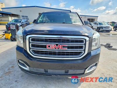 Piąte zdjęcie samochodu w środku: 2017 GMC YUKON XL C1500 SLT VIN:1GKS1GKC8HR332009 - miniatura