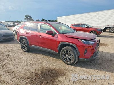 Czwarte zdjęcie samochodu z boku: 2022 TOYOTA RAV4 XLE PREMIUM VIN:JTMB6RFV6ND064672 - miniatura