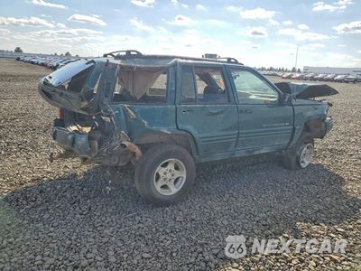 Trzecie zdjęcie samochodu z tyłu: 1998 JEEP GRAND CHEROKEE LAREDO VIN:1J4GZ48YXWC166257 - miniatura