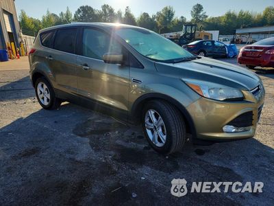 Czwarte zdjęcie samochodu z boku: 2014 FORD ESCAPE SE VIN:1FMCU0GX0EUA97250 - miniatura