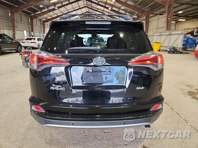 Zdjęcie 6 z 13 samochodu: 2018 TOYOTA RAV4 XLE VIN:2T3WFREV6JW522937 - miniatura