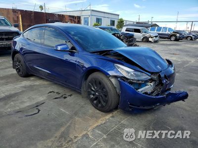 Czwarte zdjęcie samochodu z boku: 2023 TESLA MODEL 3 VIN:5YJ3E1EA9PF693412 - miniatura