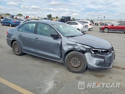 Czwarte zdjęcie samochodu z boku: 2014 VOLKSWAGEN JETTA BASE VIN:3VW2K7AJ3EM226506 - miniatura