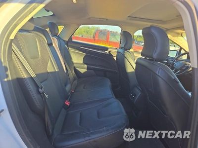 Zdjęcie 10 z 13 samochodu: 2018 FORD FUSION TITANIUM/PLATINUM HEV VIN:3FA6P0RU1JR124846 - miniatura
