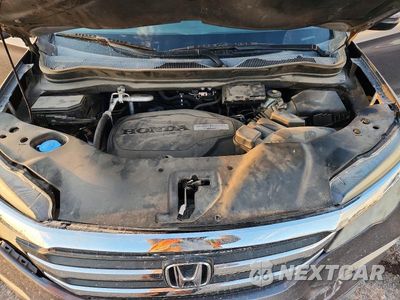 Zdjęcie 12 z 13 samochodu: 2017 HONDA PILOT EXL VIN:5FNYF5H52HB031035 - miniatura