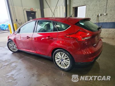 Drugie zdjęcie samochodu z przodu: 2015 FORD FOCUS TITANIUM VIN:1FADP3N20FL334406 - miniatura