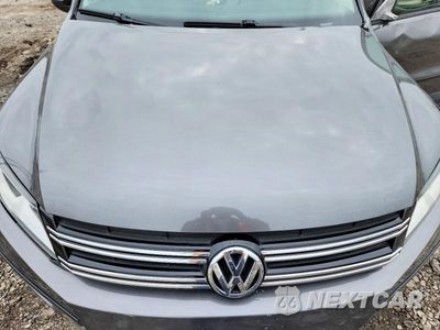 Zdjęcie 12 z 13 samochodu: 2014 VOLKSWAGEN TIGUAN S VIN:WVGBV3AX5EW624643 - miniatura
