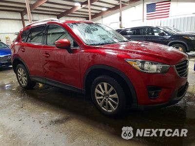 Czwarte zdjęcie samochodu z boku: 2016 MAZDA CX-5 TOURING VIN:JM3KE4CY5G0812589 - miniatura