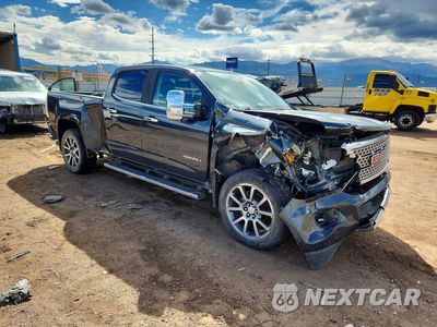 Czwarte zdjęcie samochodu z boku: 2017 GMC CANYON DENALI VIN:1GTP6EE11H1235427 - miniatura