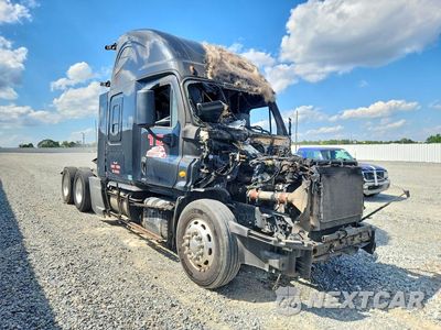 Czwarte zdjęcie samochodu z boku: 2014 FREIGHTLINER CASCADIA SEMI TRUCK VIN:3AKJGLD50ESFT1812 - miniatura