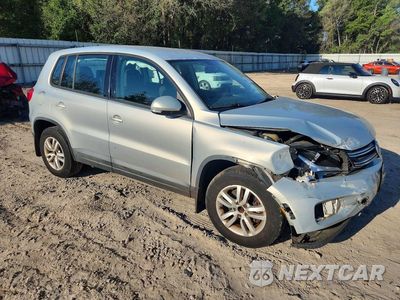 Czwarte zdjęcie samochodu z boku: 2014 VOLKSWAGEN TIGUAN S VIN:WVGBV3AX7EW532269 - miniatura