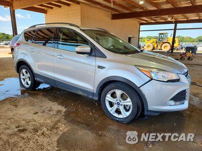 Czwarte zdjęcie samochodu z boku: 2014 FORD ESCAPE SE VIN:1FMCU0G99EUB84386 - miniatura