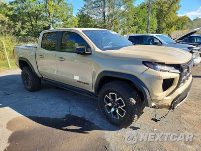 Czwarte zdjęcie samochodu z boku: 2024 GMC CANYON AT4X VIN:1GTP6EEK3R1129197 - miniatura