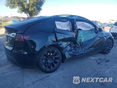 Trzecie zdjęcie samochodu z tyłu: 2023 TESLA MODEL Y VIN:7SAYGDEE3PF863111 - miniatura