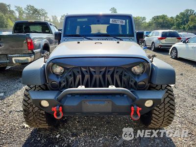 Piąte zdjęcie samochodu w środku: 2015 JEEP WRANGLER UNLIMITED SPORT VIN:1C4BJWDG1FL771185 - miniatura