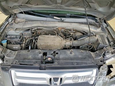 Zdjęcie 12 z 13 samochodu: 2007 HONDA PILOT EXL VIN:5FNYF18797B013799 - miniatura