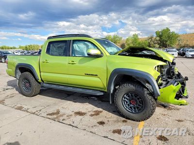 Czwarte zdjęcie samochodu z boku: 2022 TOYOTA TACOMA TRD PRO VIN:3TYCZ5AN7NT069898 - miniatura