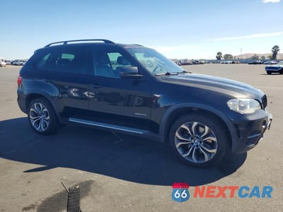 Czwarte zdjęcie samochodu z boku: 2012 BMW X5 XDRIVE50I VIN:5UXZV8C5XCL425645 - miniatura