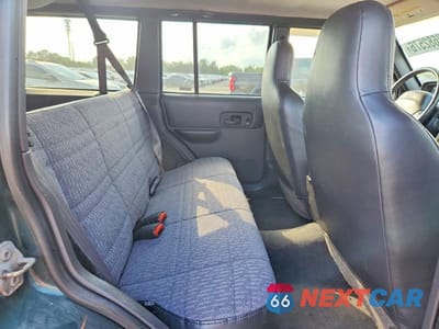 Zdjęcie 11 z 13 samochodu: 2000 JEEP CHEROKEE SPORT VIN:1J4FF48S0YL164357 - miniatura