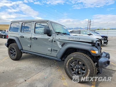 Czwarte zdjęcie samochodu z boku: 2021 JEEP WRANGLER UNLIMITED SPORT VIN:1C4HJXDG2MW631805 - miniatura