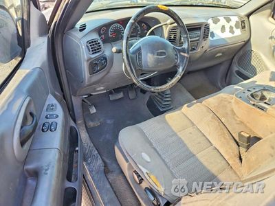 Zdjęcie 8 z 12 samochodu: 2003 FORD F150 VIN:1FTRX18W23NA13728 - miniatura