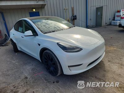 Czwarte zdjęcie samochodu z boku: 2023 TESLA MODEL Y VIN:7SAYGDEF2PF811235 - miniatura
