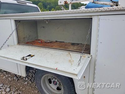 Zdjęcie 10 z 13 samochodu: 2004 GMC NEW SIERRA K3500 VIN:1GDJK34254E364768 - miniatura