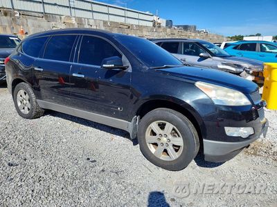 Czwarte zdjęcie samochodu z boku: 2010 CHEVROLET TRAVERSE LT VIN:1GNLRFED8AS146869 - miniatura
