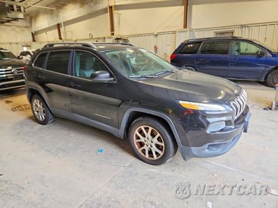 Czwarte zdjęcie samochodu z boku: 2014 JEEP CHEROKEE LATITUDE VIN:1C4PJLCSXEW288527 - miniatura