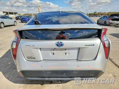 Zdjęcie 6 z 13 samochodu: 2017 TOYOTA PRIUS TWO VIN:JTDKBRFU1H3566275 - miniatura